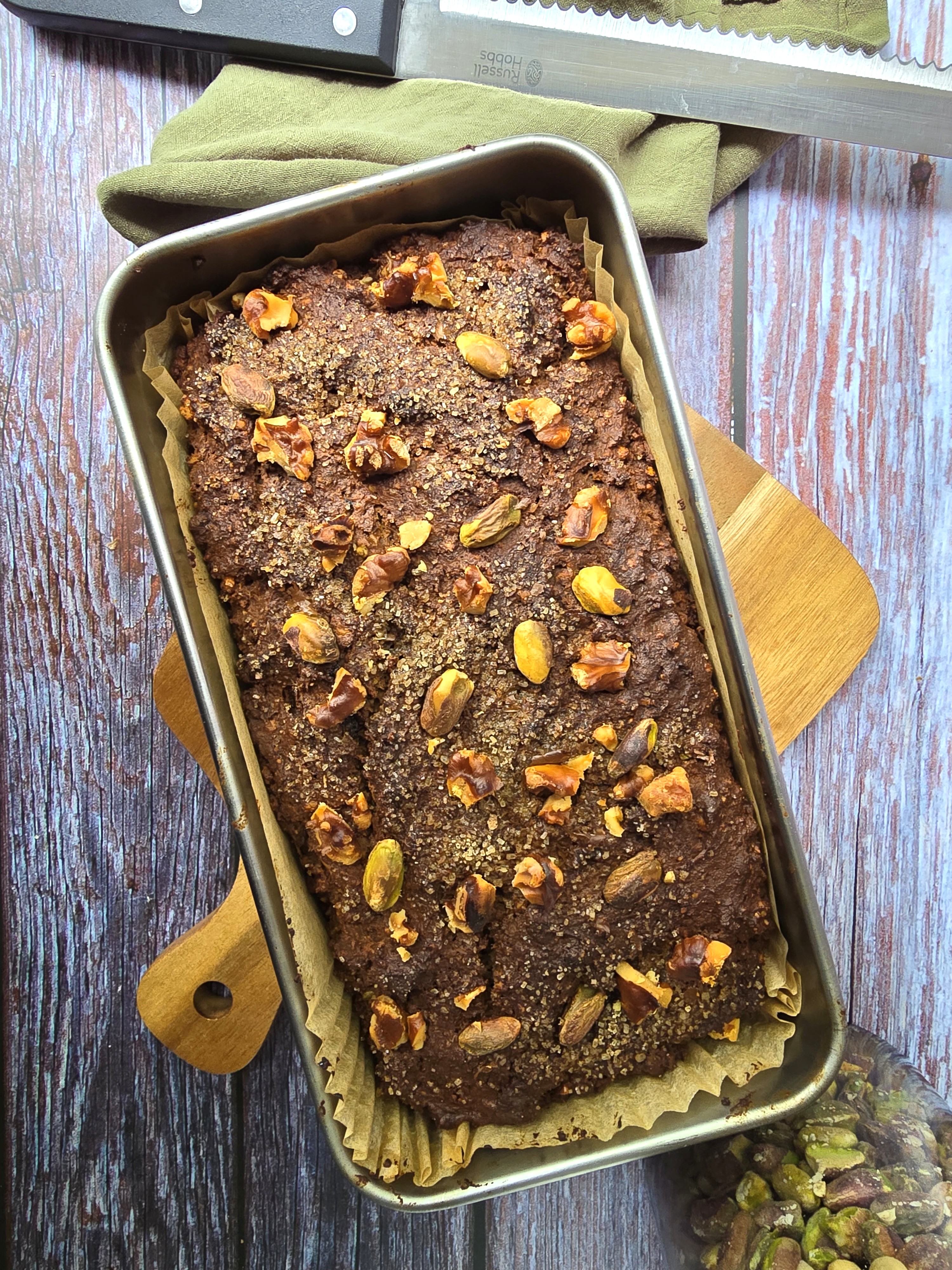 Baked date-sweetened nut cake with pistachio and walnuts.