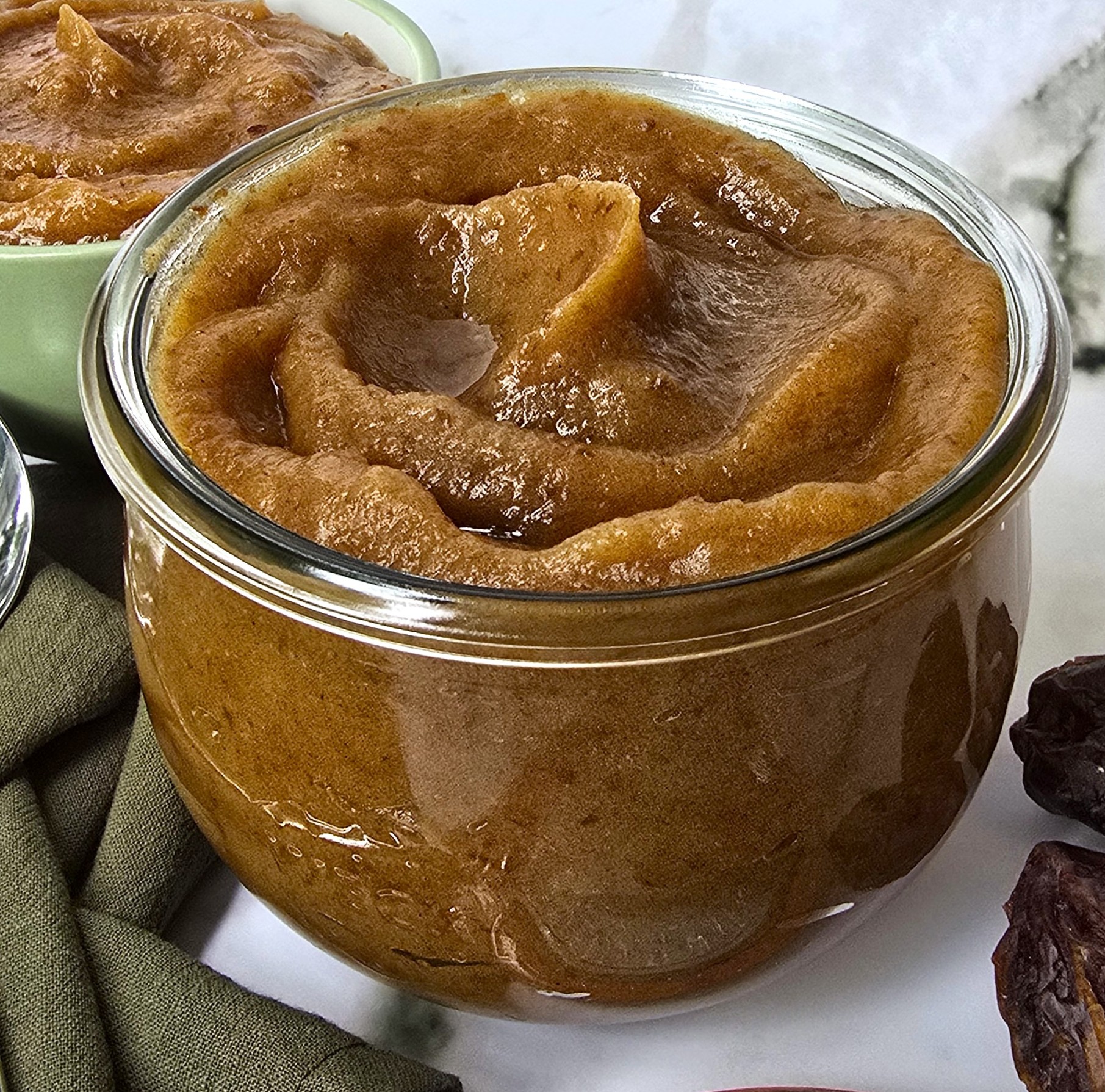 a storage jar with paste of dates