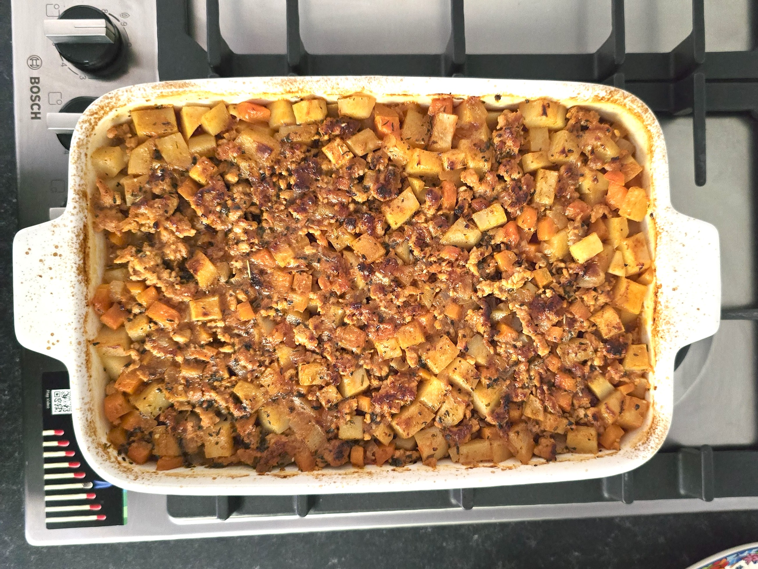 baked moussaka ready for the toppings