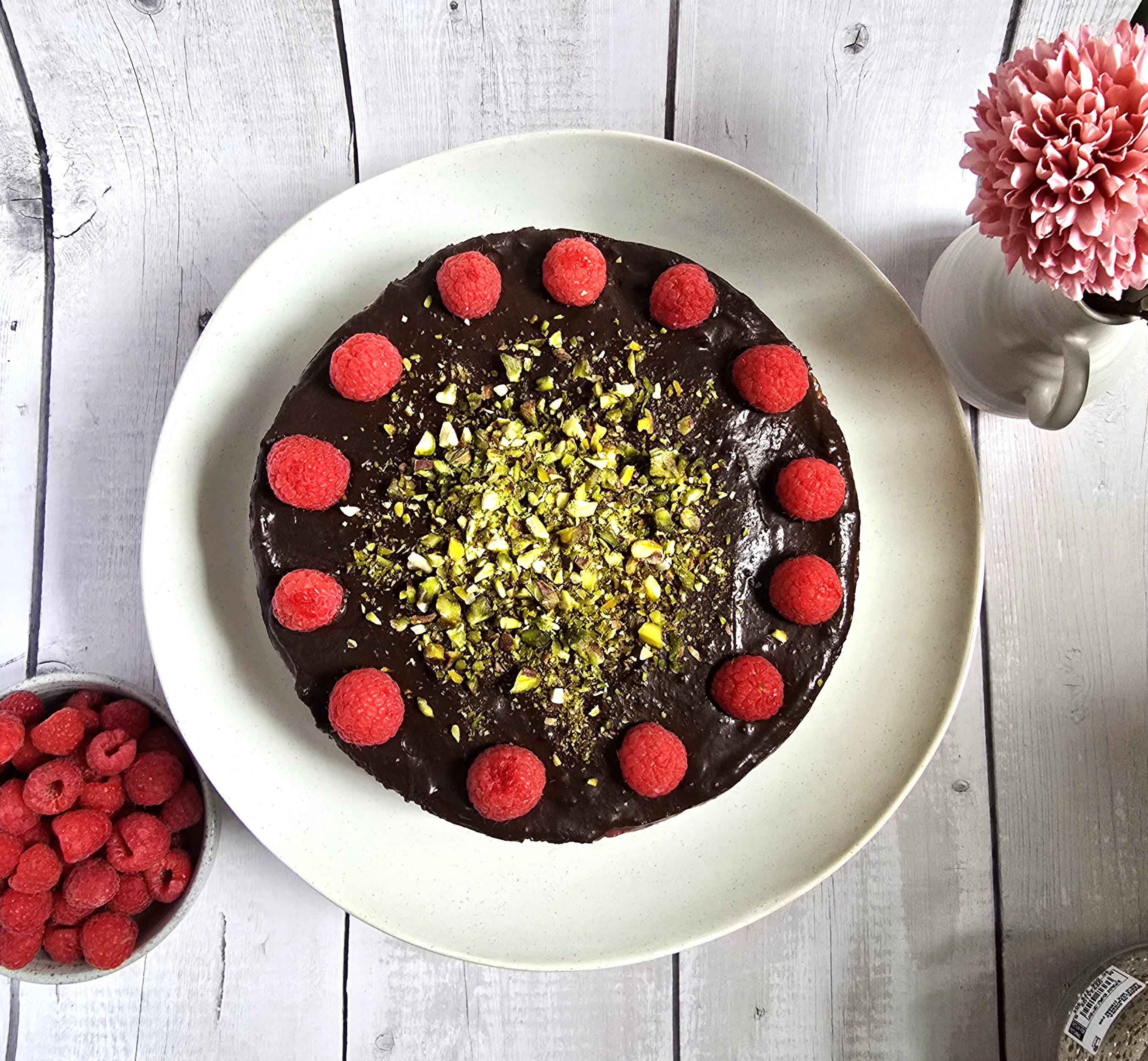 no-bake yoghurt pie with date-nut base, chocolate topping and raspberry chia jam