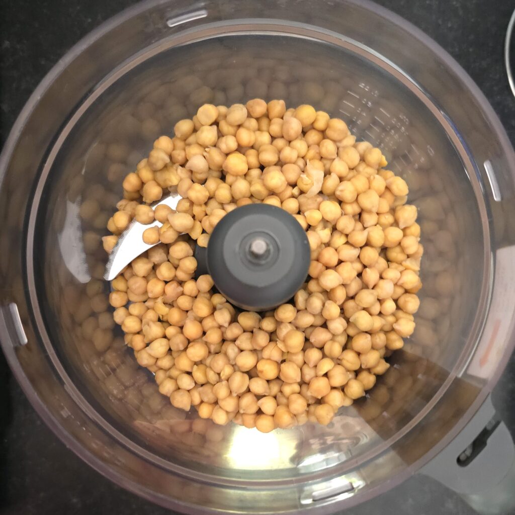 chickpea in a food processor, ready for blending